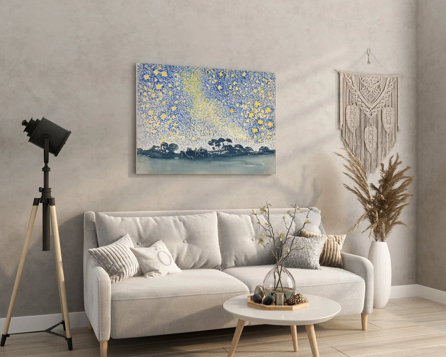 Abstract blue and yellow wall art print above modern sofa in cozy living room decor