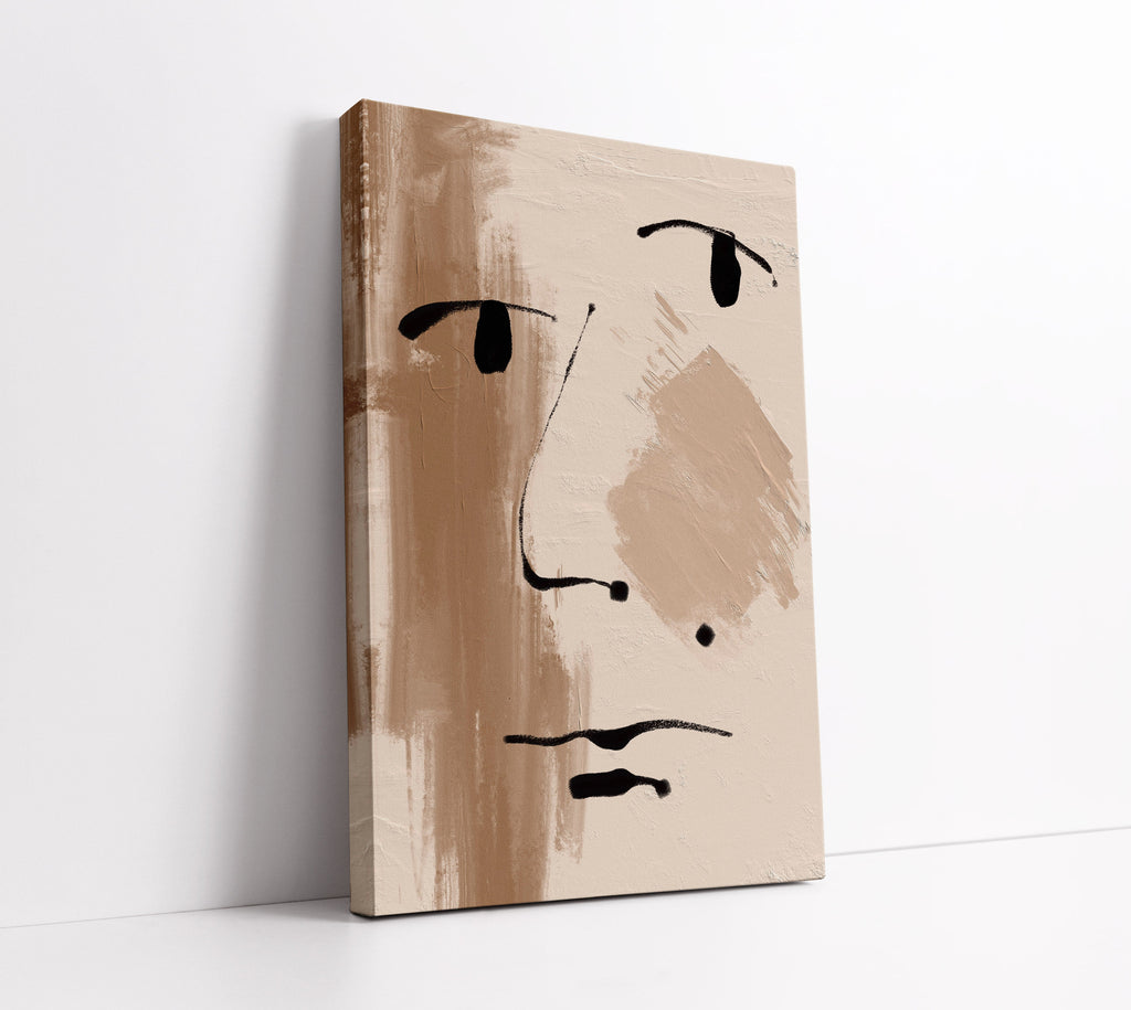 Abstract face canvas art with black brushstrokes on beige background, modern wall decor