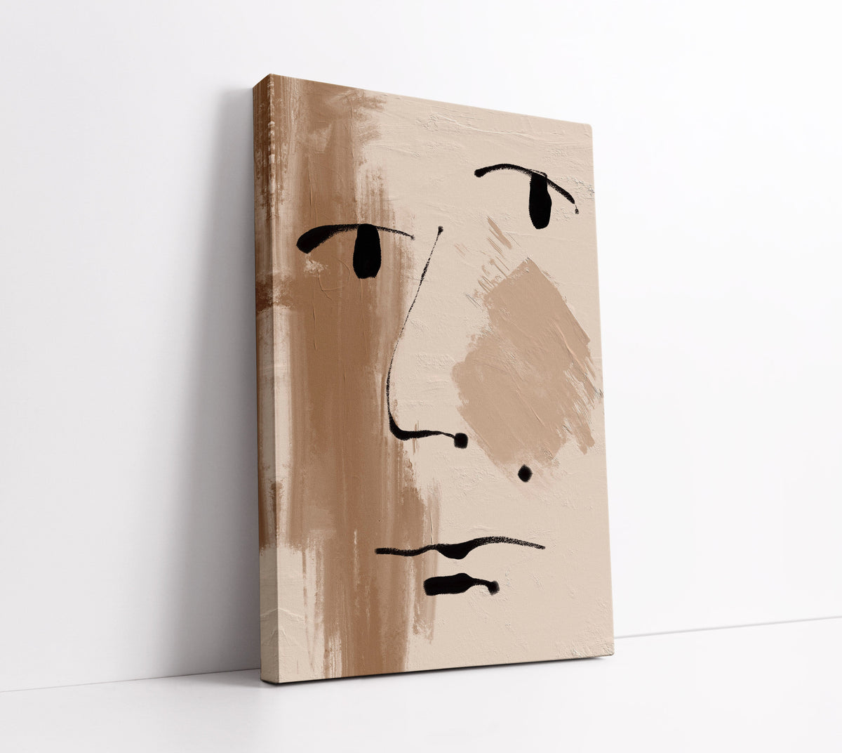 Abstract face canvas art with black brushstrokes on beige background, modern wall decor