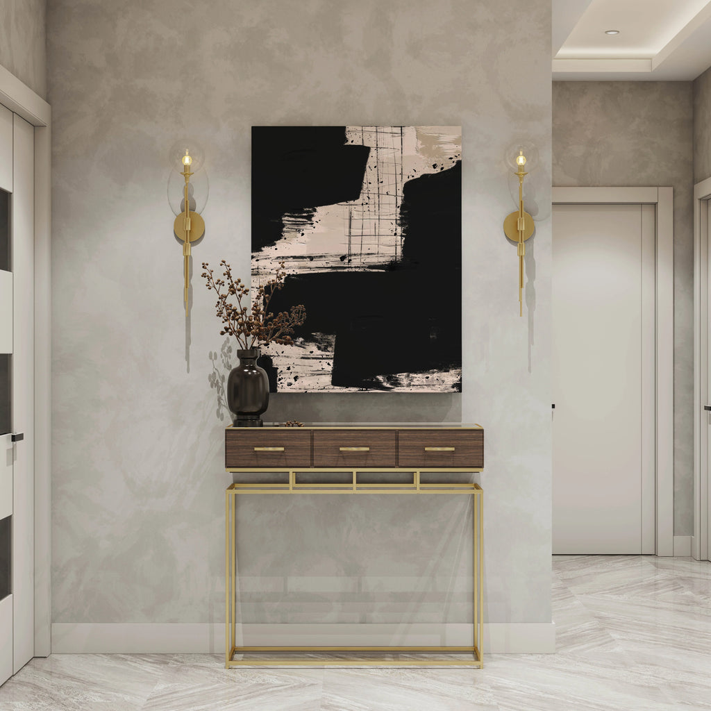 Black and beige abstract wall art print above modern console table in luxury hallway decor